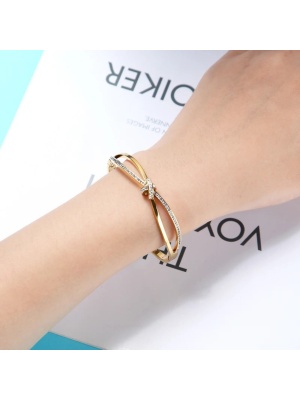 Women's bracelet with a semicircle cross made of gold stainless steel