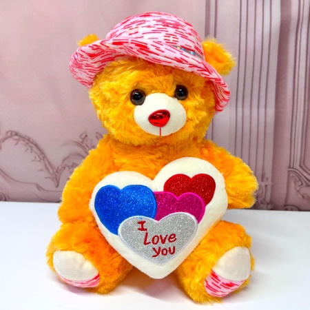 Ursulet de plus Pudding, cu palarie satinata si inimioara imprimata "I Love You", inaltime 33 cm, Portocaliu