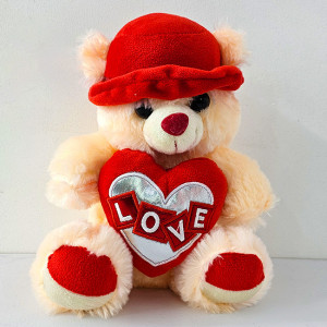 Ursulet de plus Pudding, palarie cu bentita satinata si inimioara imprimata "Love", inaltime 30 cm, Crem