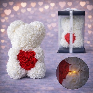 Ursulet floral 25 cm, cu LED-uri luminoase, din trandafiri, spuma alb cu inima rosie, in cutie cadou