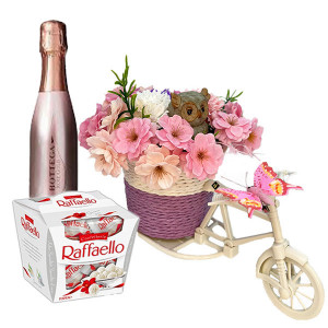 Aranjament floral in cosulet pe suport de bicicleta, roz