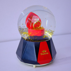 Cutiuta muzicala sub forma de glob, cu inel in interior, 15cm
