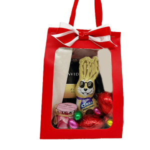 Pachet HappyEaster, Cafea Davidoff Fine Aroma, whisky Baileys’, lumanare parfumata cu mireasma de rose, iepuras milka oreo si 11 ousoare de ciocolata        