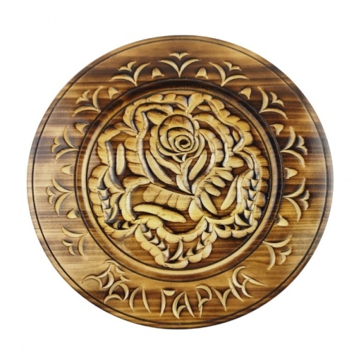 Decorative carved wooden plate with a smoked finish