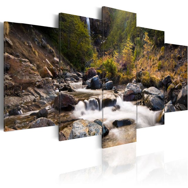 Tablou - A waterfall in the middle of wild nature