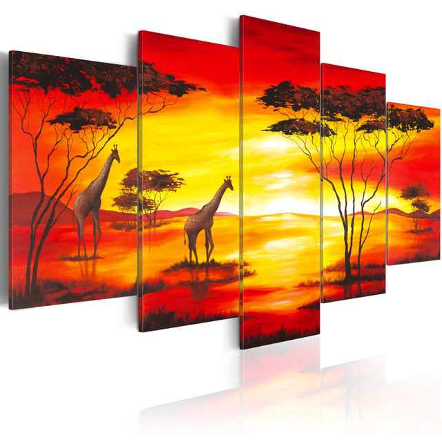 Tablou - Giraffes on the background with sunset
