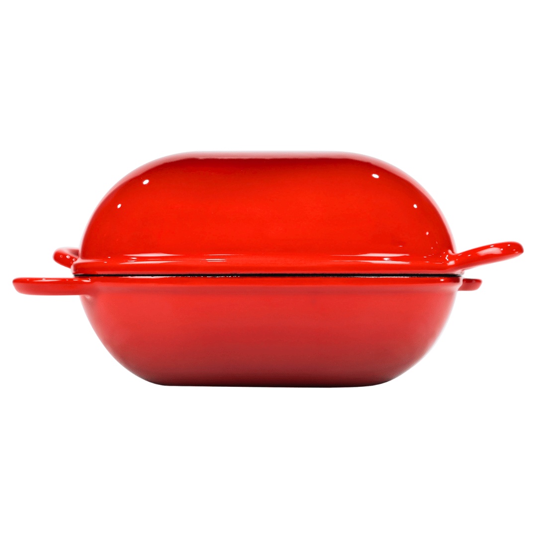 Vas din fonta emailata pentru copt paine, Crucible Cookware, tip cuptor olandez cu capac, forma ovala, 24x16cm, 2.7 L, rosu