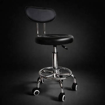 Taburet de salon negru iluminat dramatic, cu suport cromat pentru picioare