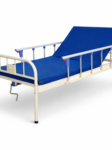 Manually adjustable hospital bed with mattress, crank, side guards, steel frame