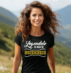 Femeie care poartă un tricou negru personalizat cu mesajul: ''Legendele se nasc in noiembrie''.
