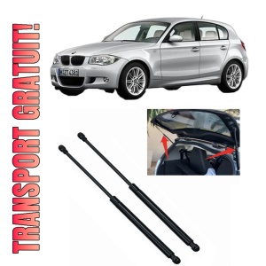 Set 2 amortizoare portbagaj haion BMW Seria 1 (E87) din 2004-2011, 2 bucati, MAGNUM TECHNOLOGY, 4 stickere auto BMW Seria