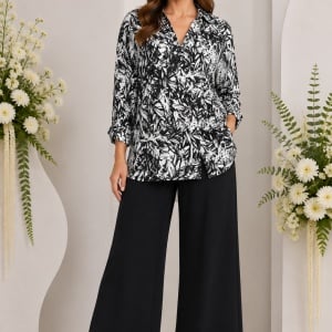 Compleu alb-negru cu bluză imprimată și pantaloni largi