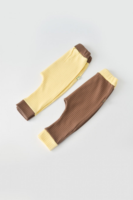 Set 2 pantaloni Ribana Bebe Unisex din bumbac organic si 5%elastan - Vanilie/Maro BabyCosy (Marime: 12-18 Luni)