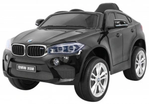 Masinuta Electrica cu acumulator pentru copii NOVOKIDS™ BMW X6 M, Roti din Cauciuc EVA, Max 30 kg , Usi cu deschidere , Baterie12V, 2 Viteze, Lungime 116 cm, 2 motoare 390 W, Negru