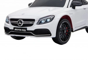 Masinuta-Electrica-cu-acumulator-pentru-copii-NOVOKIDS-Mercedes-C63S-AMG-Coupe-Cu-telecomanda-Roti-din-Cauciuc-EVA-3-8-ani-Usi-cu-deschidere-Baterie12V-2-Viteze-Lungime-116-cm-2-motoare-Alb_1