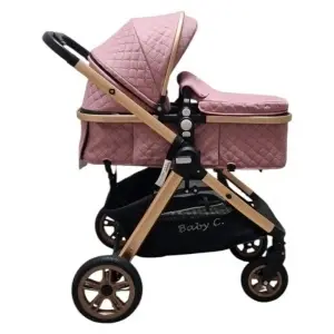 landou carucior Baby Care X2S roz vedere laterala cu copertina extinsa si roti maro