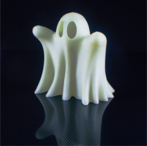 Fluorescent white ghost statuette