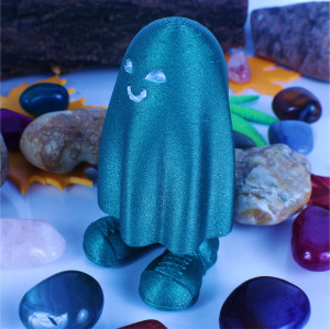 Green ghost statuette
