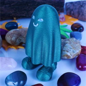 Green ghost statuette