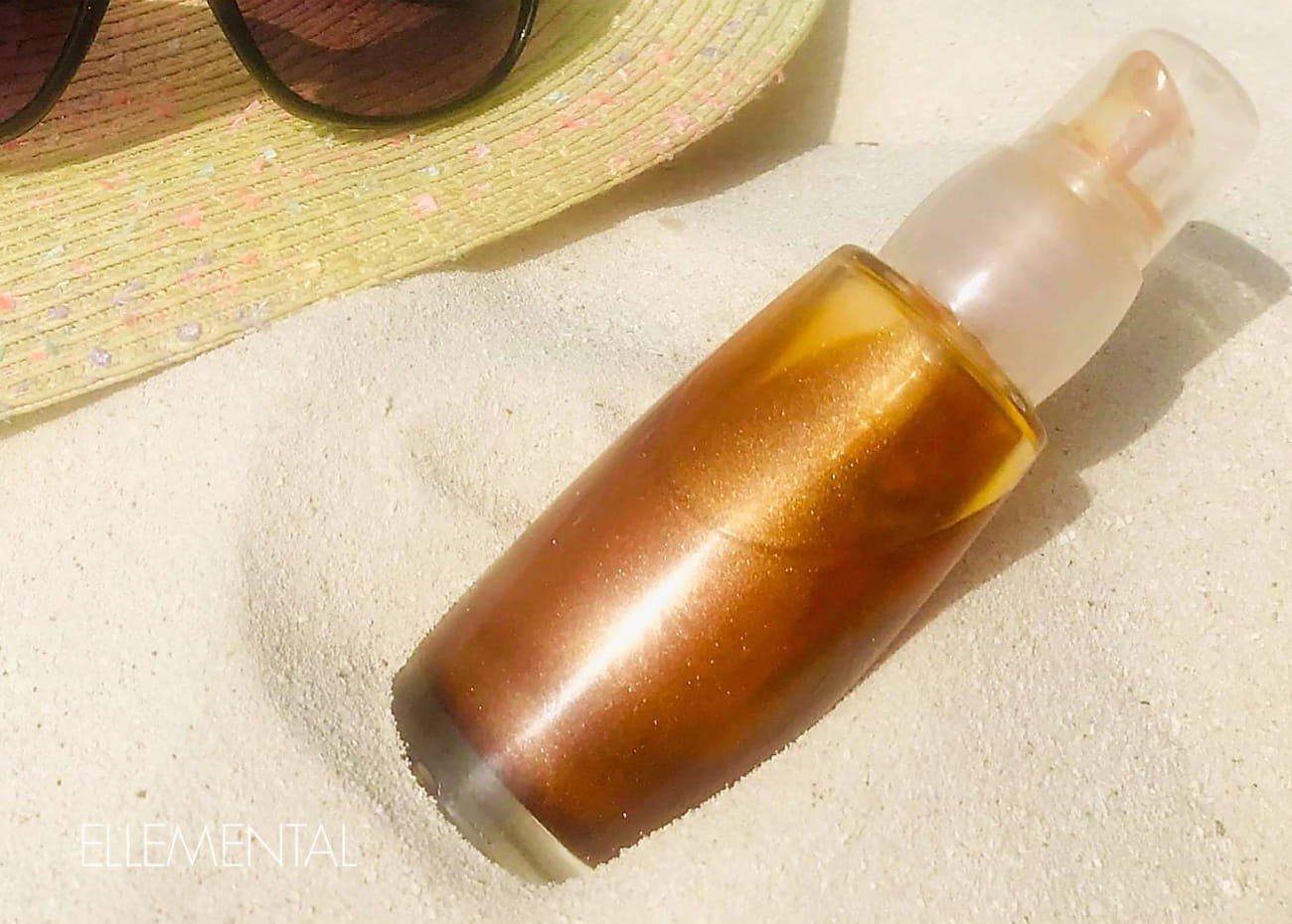 Olio da spiaggia con 5 oli protettivi