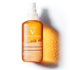 Apa cu protectie solara SPF 50 cu beta-caroten pentru fata si corp Capital Soleil, 200 ml, Vichy