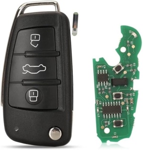 Telecomanda auto Audi cu 3 butoane si placa electronica verde vizibila