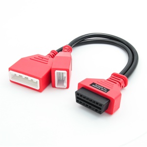 Adaptor OBD2 Techstar pentru Nissan 16 + 32 pini, vedere pe alb cu ambele mufe rosii