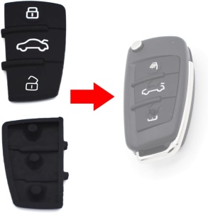 Buton cauciuc cheie Audi – cu săgeată roșie indicând direcția de montaj