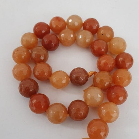 Brown-reddish agate, faceted, 12 mm