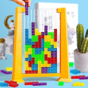 Joc de inteligenta Tetris puzzle tangram Flippy, 70 de piese multicolore, 3D, montessori, interactiv, din plastic, zar inclus, sac depozitare piese, varsta peste 6 ani, 23 x 19.8 x 5 cm, cadru galben - Img 8
