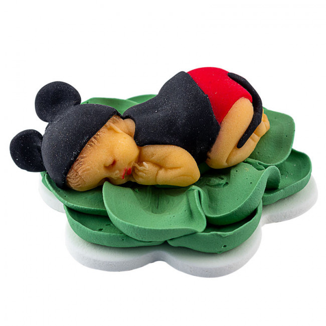 Bebe Mickey dormind pe o floare verde din pasta de zahar - Lumea