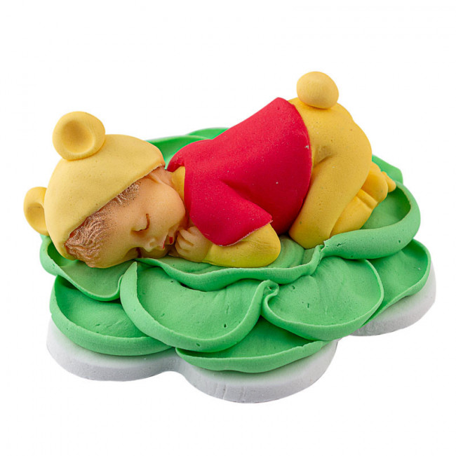 Bebe ursuletul Winnie dormind pe o floare verde din pasta de zahar - Lumea