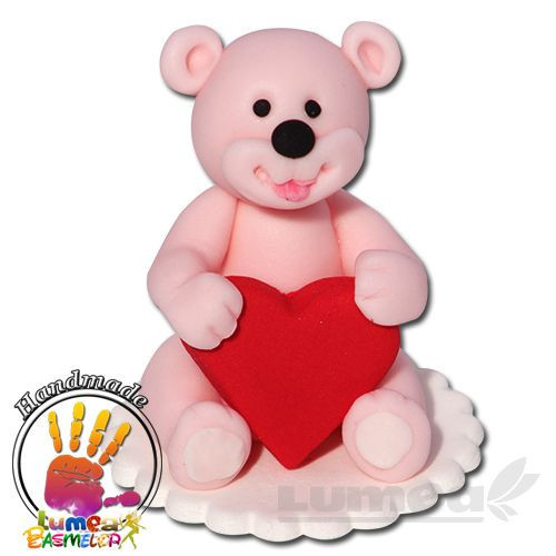 Ursulet roz cu inima din pasta de zahar, L6 cm x l6 cm x h7 cm, 80g - Lumea