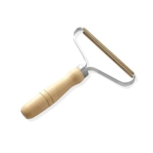 Instrument portabil pentru indepartarea scamelor de pe haine - Img 3