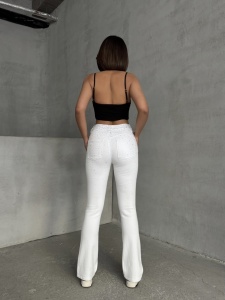 Blugi evazati elastici cu strasuri aplicate - Img 4