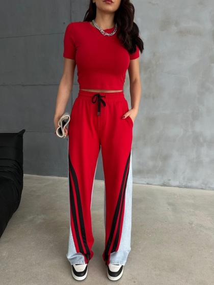 Pantaloni evazati cu denim si material textil