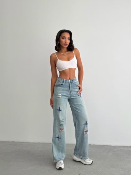 Blugi evazati elastici cu insertii brodate - Img 4