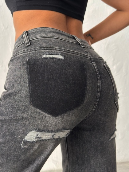 Blugi evazati elastici cu rupturi la spate - Img 1
