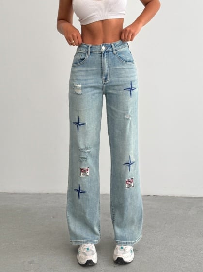 Blugi evazati elastici cu insertii brodate - Img 5