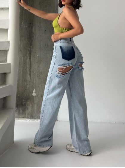 Blugi wide-leg cu rupturi pe posterior