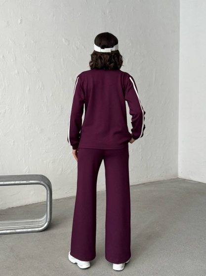 Compleu cu pantaloni evazati si buzunare din fas - Img 4