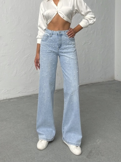 Blugi evazati elastici cu perle