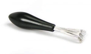 Instrument pentru curatarea periilor de par