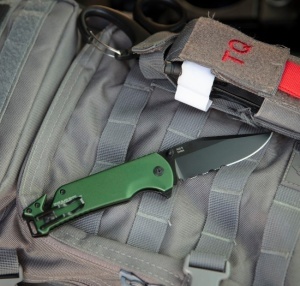 Cutit pliabil SOG Escape 2.0 Olive Drab 11-52-01-43, lama Clip Point AUS-8 partial zimtata, deschidere asistata, taietor centura, spargator geam - Img 7