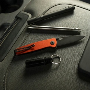Cutit pliabil SOG Twitch III Burnt Orange 11-15-05-43, lama Drop Point D2, deschidere asistata S.A.T., maner aluminiu portocaliu, EDC Premium - Img 9