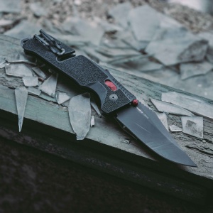 Cutit pliabil SOG Trident AT Black 11-12-01-41, lama Clip Point CRYO D2 Black TiNi, deschidere asistata S.A.T., AT-XR Lock, taietor de centura, spargator geam, maner GRN Black - Img 10