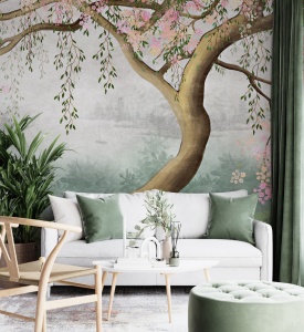 Living spațios cu canapea albă și plante verzi, având pe perete un fototapet peisaj romantic cu copac, tapet personalizat stil pictură