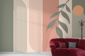Fototapet geometric boho în living, în spatele unei canapele roșu-burgundy din catifea, cu perne roșii și gri