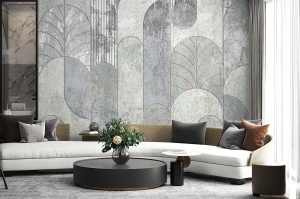 Fototapet geometric art deco gri montat în living, cu canapea curbată și perne colorate