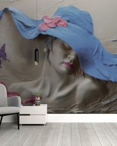 Colț de relaxare modern cu fotoliu gri și comodă albă, decorat cu fototapet portret artistic feminin în relief, tapet personalizat 3D